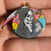 Pin calavera playa