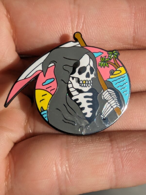 Pin calavera playa