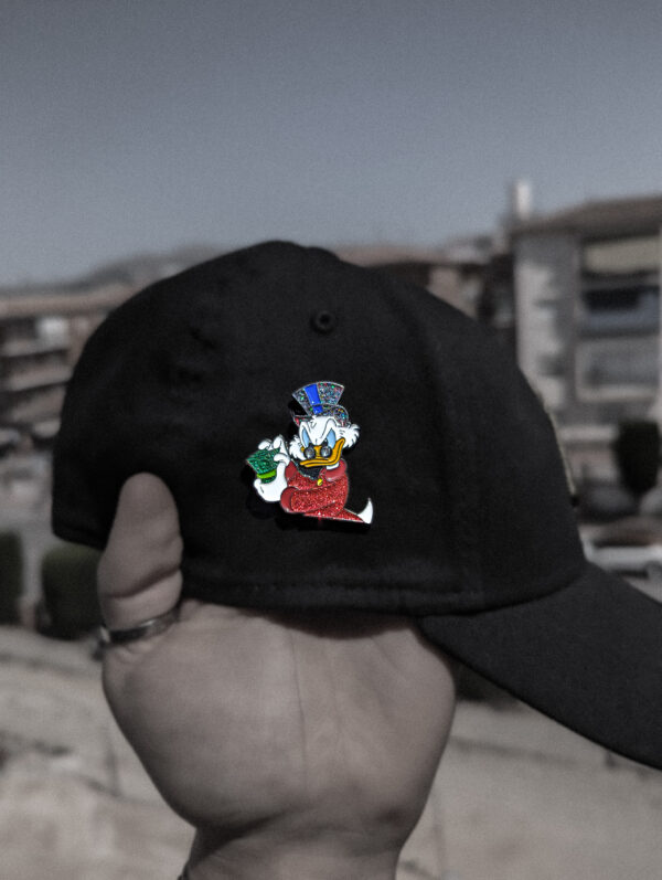 Pin Pato Donald con Dinero Brillante