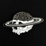 Pin Calavera Planeta